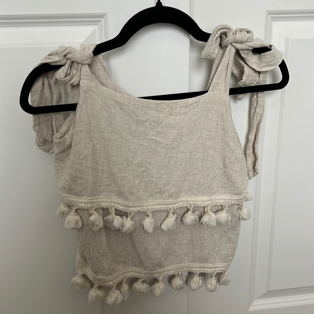 Linens top with tassels and tie straps